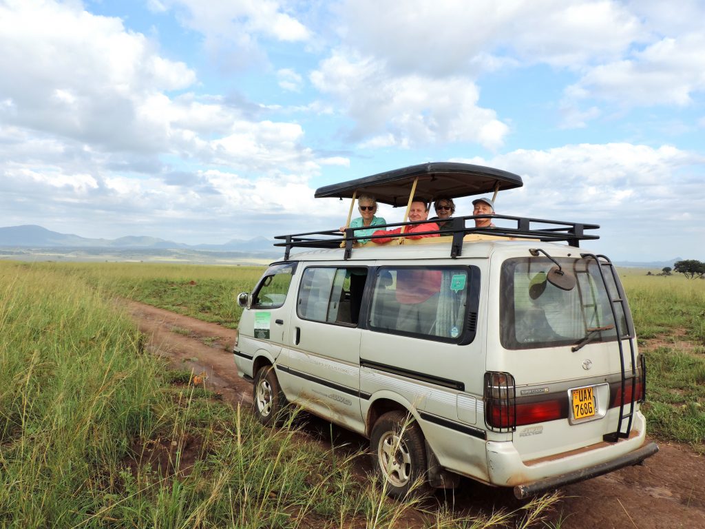 Hire a safari van with pop up roof in uganda